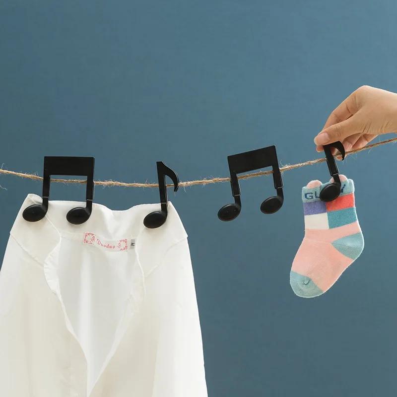 Baby Clothing Drying Rack - مشبكان للملابس على شكل نوتة موسيقية،